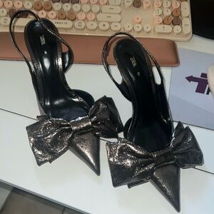Gun medal slingback bow shoes
